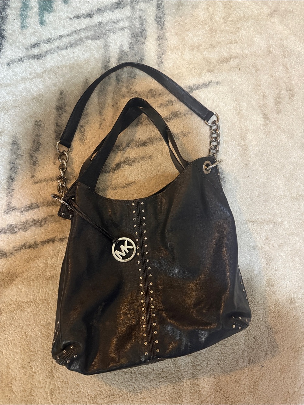 Michael Kors dark Navy Leather Studded Shoulder Bag with MK Charm.